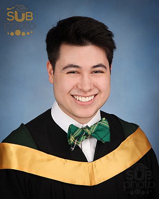 Grad wearing bowtie in University of Alberta colours